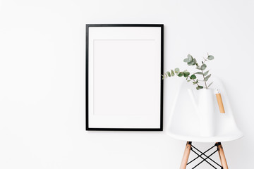 Large Black frame mockup on white wall. Simple modern interior. Art template. Background. Print mockup, posyter mockup
