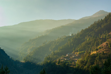 Ascending from Kinja village. Trekking in Nepal Himalayas. EBC (Everest base camp trek) trail between Jiri and Lukla - lower part of Everest trek. Nepal.
