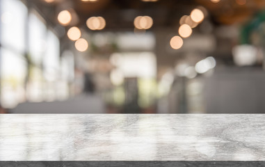 Empty Marble table top with light bokeh on blurred restaurant background