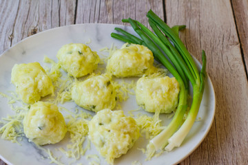 Balls with cottage cheese and herbs with cheese