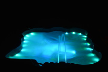 Closeup on a spa with interior lighting at night