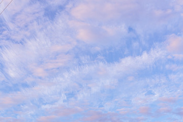 The texture of the blue sky with many beautiful clouds.