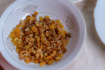 Raisins in a plate as a filling for buns