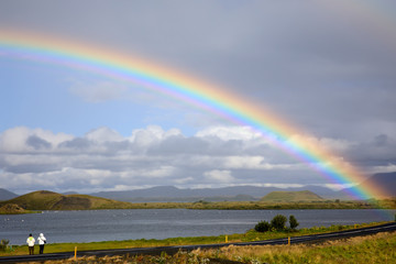 Myvatn / Iceland - August 30, 2017: A spectacular rainbow at lake Myvatn, Iceland, Europe