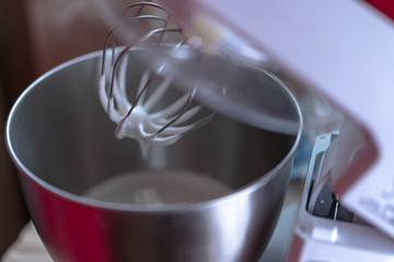 Pressing the mixer cover open button