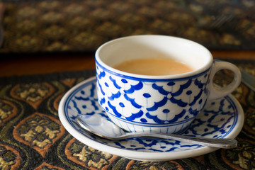 Beautiful vintage cup of coffee with beautiful background.