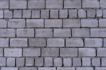 Wall of concrete blocks as background and textured