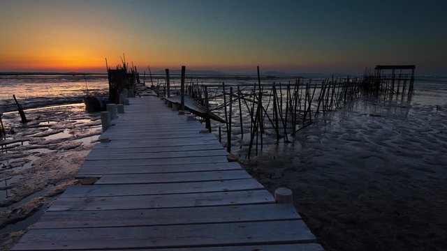 Sunset at stilt harbor, Carrasqueira, Comporta, Portugal - Timelapse
