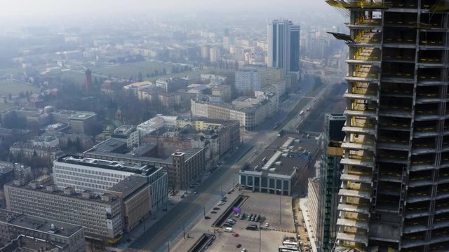 Drone 4k. View of city during Coronavirus. Warsaw in Poland. Skyscreapers, buildings, streets.