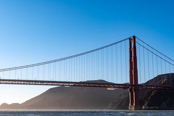 Famous Golden Gate Bridge in San Francisco California USA. The Golden Gate Bridge is a suspension bridge spanning the Golden Gate connecting San Francisco bay and pacific ocean