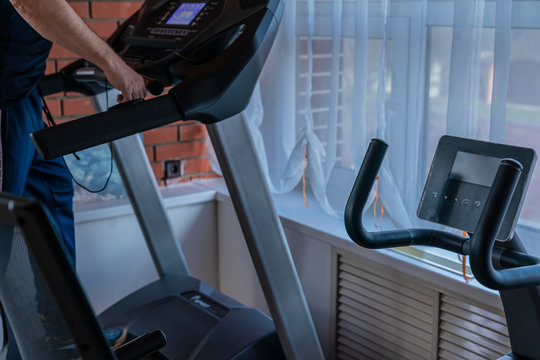 Man On A Treadmill. House Insulation.