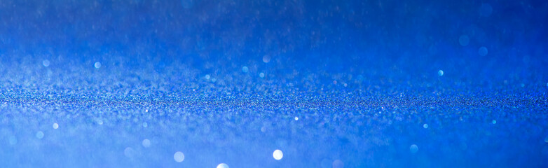Naklejka na ściany i meble blue bokeh lights defocused effect lens. abstract background