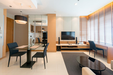 Spacious white and wooden living room with modern 