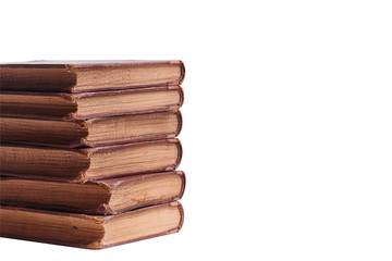 A stack of old books bound in brown leather, isolated on a white background. Space for text