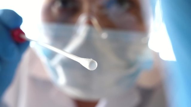 doctor opening swab taking collecting nasal throat swab pov patient perspective