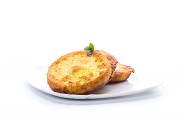 round bread croutons fried in batter in a plate