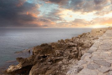 Cloudy sunset by the sea