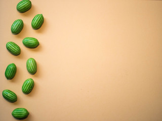 green gummy candies background