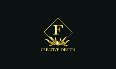 Elegant design of royal vector logo with letter F on black background. Stylish golden floral monogram for business, restaurant, boutique, cafe, hotel, labels and more.