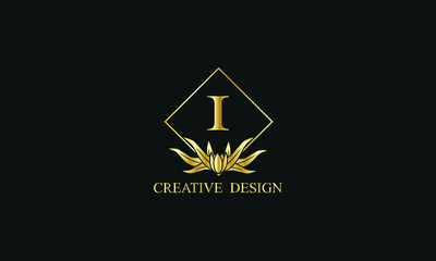 Elegant design of royal vector logo with letter I on black background. Stylish golden floral monogram for business, restaurant, boutique, cafe, hotel, labels and more.