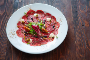 Marbled beef carpaccio. Top view, flat lay