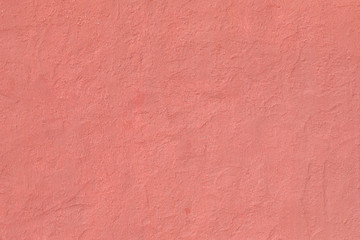 Fototapeta premium red painted plaster wall