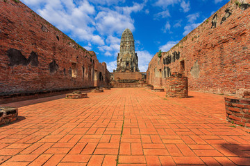 Fototapeta premium Ayutthaya, Thailand Many tourists from around the world in Wat Chaiwatthanaram, the Grand Palace of Thailand. Ayutthaya, Thailand Famous tourist attractions of Ayutthaya