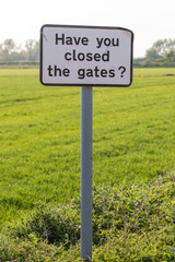 sign asking have you closed the gate ?