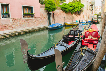 Fototapeta na wymiar Scenic canal with gondola, Venice, Italy