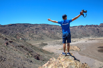 Photographer near the Teide volcano in Tenerife. The volcano El Teide in Tenerife, Spain