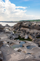 Thailand grand canyon (sam phan bok) at Ubon Ratchathani, Thailand. Beautiful landscape of holes and rock mountain with river.