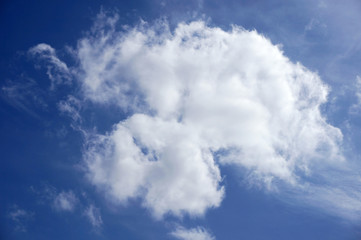 Naklejka na ściany i meble Blue sky background with white clouds 
