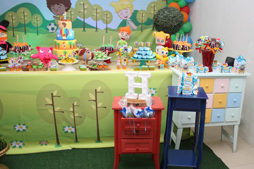 Child's birthday. Cake table with sweets and decoration