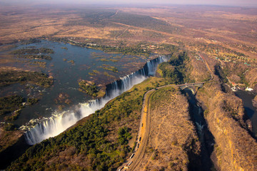 Victoria Falls in Zimbabwe from the air - obrazy, fototapety, plakaty