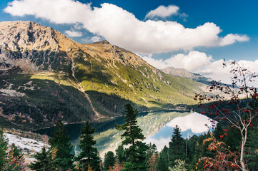 Fototapeta na wymiar Eye of the Sea Lake in Tatra Mountains, Zakopane, Poland. Mirror clean lake in the mountains, amazing views of the Morskie Oko Lake.