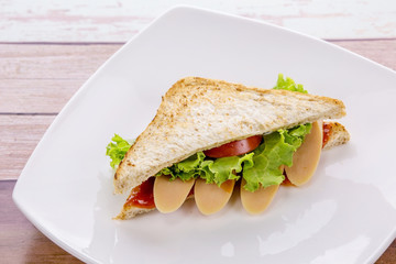 Sandwich on white plate