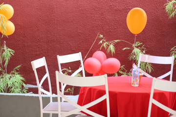 Child's birthday. Guests table arranged with balloons