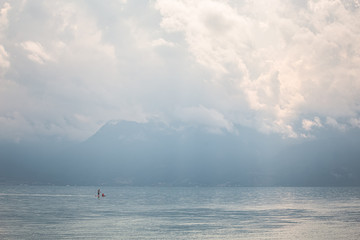 a walk on a sup board with a child, Lake Geneva, Switzerland