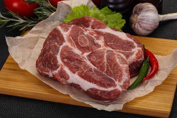 Raw pork neck steak