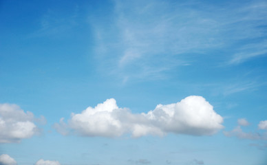 Blue sky background with white clouds    