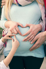 pregnant woman with her husband