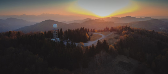 Aerial drone panorama view of a rain radar or meteorological doppler radar for measuring...