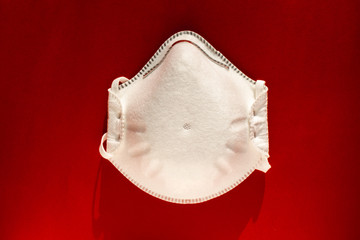 medical mask on the red background