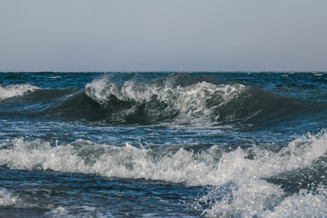 Sea waves with white foam