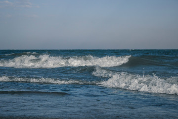 Sea waves with white foam