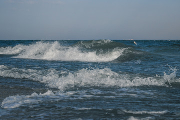 Sea waves with white foam