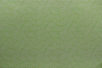 A close up color image of twisted leaves design on paper that is used for crafting and card making.