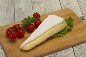 Brie cheese triangle served salad