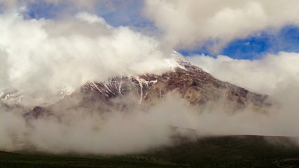 clouds over the mountains - snow covered mountains - Chimborazo - Ecuador - highest mountain in Ecuador