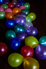Colorful balloons on the dark background